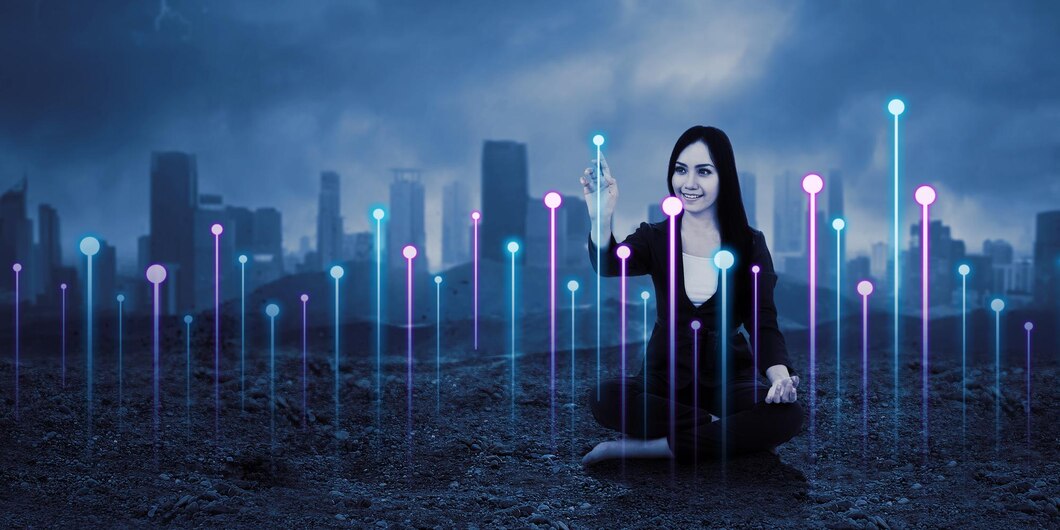 happy-businesswoman-touching-screen-interface-sitting-ground-with-blurred-city-background_175634-855